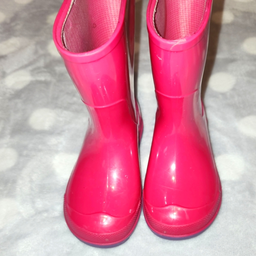 Pink rain boots
